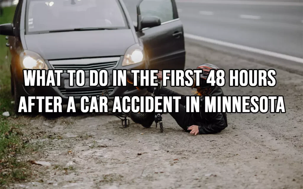 Injured motorcyclist on roadside beside fallen bike & stopped car