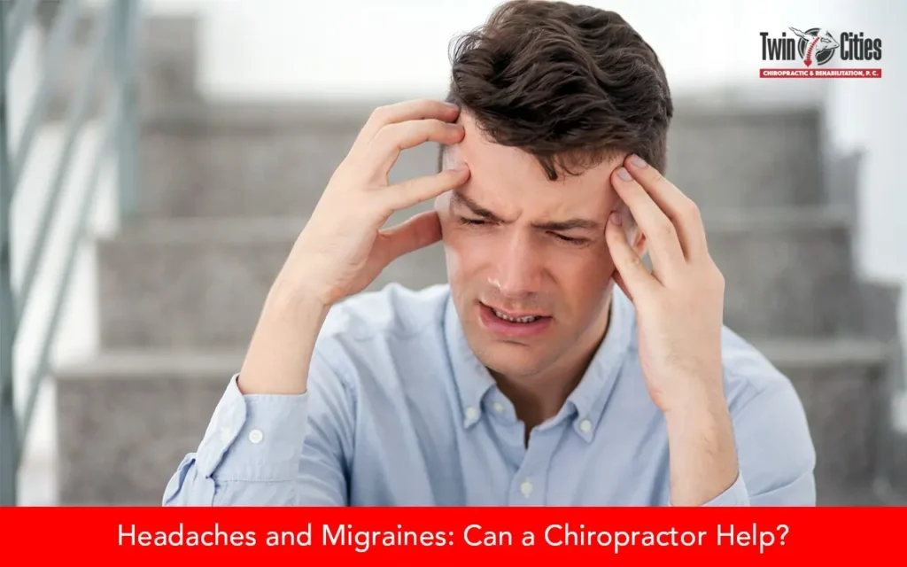 Man holding his head in pain, representing headaches and migraines treated with chiropractic care.